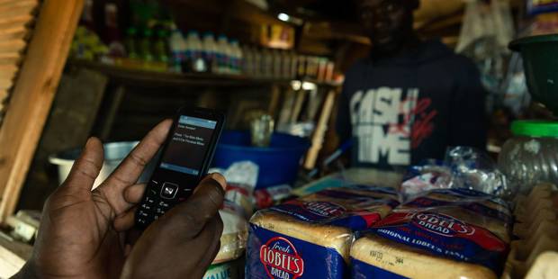 lawson2_JEKESAI NJIKIZANAAFP via Getty Images_cash transfer