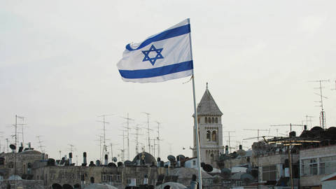 benami213_YEHUDA RAIZNERAFP via Getty Images_israelflag